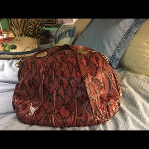 Gucci Red Python handbag with shoulder strap.